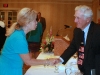 Unidentified conference supporter greets John Seigenthaler Sr. at the authors reception