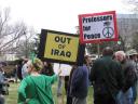 Signs held by protesters