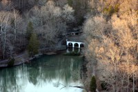 An Aerial view of Swan Lake and the entrance to Dunbar Cave.