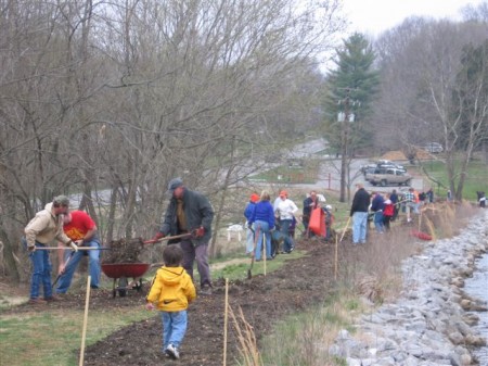 Spreading mulch on the Dam