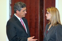 Interim Co-City Attorney Tim Harvey chats with another reception attendee