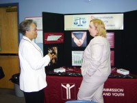 Debrah Stafford Juvenile Justice Director talks with Sarah King Juvenile Public Defender