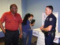 O.D. Watson NAACP Vice President talks with CPD Explorer Program Representative