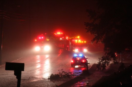 A home on Crossland Avenue was struck by a downed tree and powerlines which triggered a structure fire.