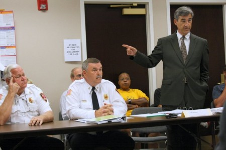 City Attorney Tim Harvey speaks as CFD Chief Roberts and Deputy Chief Stanley look on.