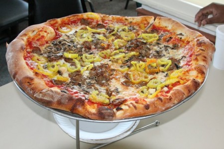 Italian sausage, mushrooms, garlic, banan peppers and 18 inches all around! Mm-m-m-m!