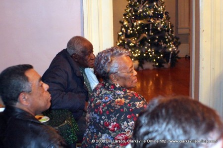 Local party members listen to the speeches