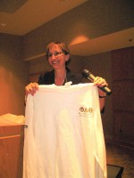 Dr. Uffelman shows off Conference T-shirt