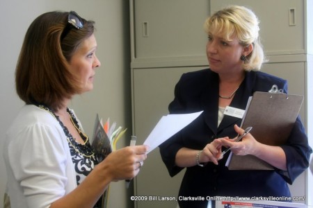 Katie Nolen discussing job opportunities with a Wendy Harrison from the Clarksville-Montgomery County Career Center