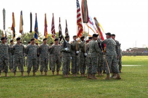 Maj. Gen. John F. Campbell receives the 101st Airborne Division (Air Assault) colors from Gen. Charles C. Campbell, commander of U.S. Forces Command, during a change-of-command ceremony at Fort Campbell, Ky., July 31.