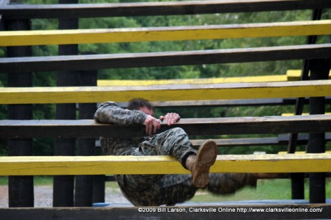 The weaver tests the abdominal muscles of the contestants