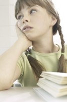 A child daydreaming in school A child daydreaming in school