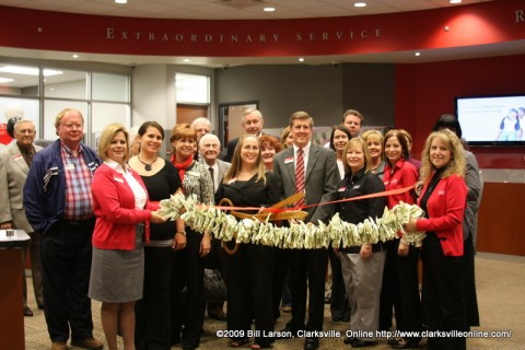 Fort Campbell Federal Credit Union employees, Board of Directors and Clarksville/Montgomery County Chamber Ambassadors at the ribbon cutting for Fort Campbell Federal Credit Union's 9th Branch