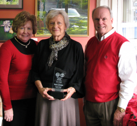 The "Most Creative Use of Lights" award was presented to Rogate’s Boutique.  (Pictured from left to Right are: Montgomery County Mayor Carolyn Bowers, Owner Rogate Hadley and City of Clarksville Mayor Johnny Piper. Photo Elizabeth Black)