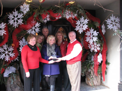 The "Best Window and Door Display" award was presented to Betty’s Antiques.  (Pictured from left to Right are: Montgomery County Mayor Carolyn Bowers, Brenda Jones, Will Harvey, Jamie Farmer, Penny Harvey and City of Clarksville Mayor Johnny Piper. Photos by Elizabeth Black)