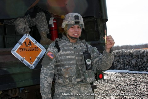 SSG Andres Ibarra showing reporters the size of a .50 caliber (12.7x99mm NATO) round that is fired by the Avenger Weapons System