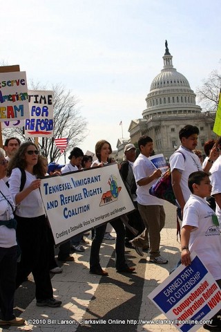 Immigration reform protesters march past the U.S. Capitol Building in Washington DC