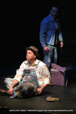 George stands behind Lennie. George stands behind Lennie.