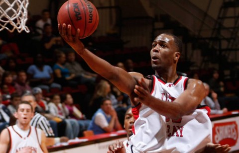 Wesley Channels rises towards the basket with a determined look on his face. (Robert Smith/The Leaf-Chronicle)