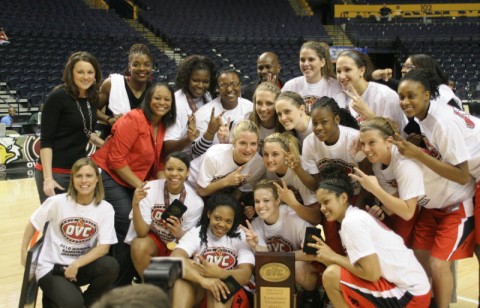 The Lady Govs pose with the 2010 OVC Tournament Championship trophy following their victory against Eastern Illinois, Saturday.