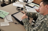 Staff Sgt. Walter Camphouse writes in Pashto Feb, 12th, 2010, during class at the Eagle Language Training Detachment at Fort Campbell, Ky. Camphouse, a Soldier in 1st Battalion, 506th Infantry Regiment, 4th Brigade Combat Team, 101st Airborne Division, was one of 74 Soldiers participating in the language training program. (Photo by Michele Vowell, Fort Campbell Courier)