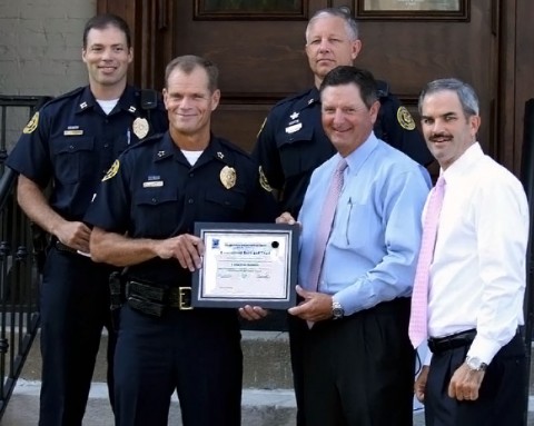 Clarksville Chief of Police Al Ansley presenting the Crime Free Certification to Cumberland Bank and Trust's President / CEO Ron Sleigh, and Charlie Koon Vice President of Marketing