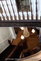 The central stairwell as seen from the upstairs landing