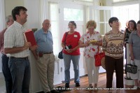 Josh Wright talks to tour members about the history of the Bailey-Killebrew House