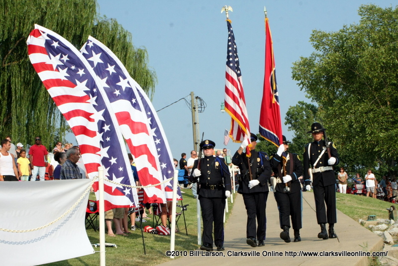 Police carrying flags