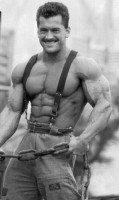 Lee Labrada sporting suspenders