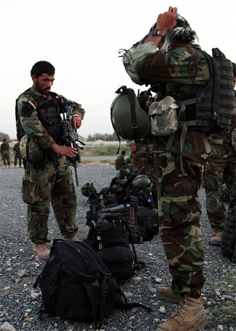 Afghan National Army soldiers prepare for an air assault mission in support of combat operations in Nuristan to reinforce security in Barg-e Matal July 25th. (Photo by U.S. Army Spc. Vitor Egorov, 55th Signal Company, Combat Camera)