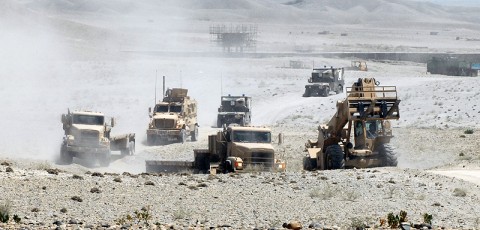 Afghan National Army soldiers from the 201st Flood Corps roll outside the gate of Forward Operating Base Gamberi to recover resupply pallets during a resupply air drop mission, July 10th. The air drop was used to resupply the base as well as traing the ANA soldiers on how to coordinate and conduct an air drop.