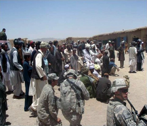 Afghan National Security Forces and Soldiers with 3rd Battalion, 187th Infantry Regiment, gather with local’s in the Marjaneh Bazaar for a shura with the Waza Khawa Sub-Governor Mohamed Ramazan, June 28th. (U.S. Army Courtesy Photo) Afghan National Security Forces and Soldiers with 3rd Battalion, 187th Infantry Regiment, gather with local’s in the Marjaneh Bazaar for a shura with the Waza Khawa Sub-Governor Mohamed Ramazan, June 28th. (U.S. Army Courtesy Photo)
