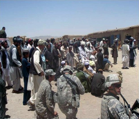 Afghan National Security Forces and Soldiers with 3rd Battalion, 187th Infantry Regiment, gather with local’s in the Marjaneh Bazaar for a shura with the Waza Khawa Sub-Governor Mohamed Ramazan, June 28th. (U.S. Army Courtesy Photo)