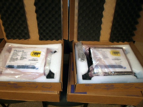 Two of the fake Apple Computer boxes with Best Buy sales tags. (Photos by: Officer Minetos)