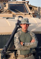 U.S. Army Spc. Chaz S. Shepard, a gunner for Troop A, 1st Squadron, 172nd Cavalry Regiment, 86th Infantry Brigade Combat Team(Mountain) stands near a vehicle at Bagram Airfield, July 13.  Shepard, a Montgomery, VT resident, was part of the assault platoon that captured a suspected insurgent in a small mountain cave June 30th, in Parwan Province.  (Photo by U.S. Army Sgt. Charles P. Espie, Task Force Wolverine Public Affairs, 86th Infantry Brigade Combat Team (Mountain))