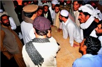 Graduates of the Vertical Engineering Skills Development Workshop hold their certificates July 5th while listening to Paktika Provincial Governor Moheebullah Samim speak here about the importance of keeping engineers working in Afghanistan. The 146 graduates also attended a job fair following the ceremony.  Both the workshop and the job fair were hosted by the Paktika Provincial Reconstruction Team.  (U.S. Army courtesy photo)