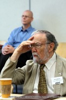 Christopher Burawa (rear) and Gerry Gilman (front) listening to Matthew Gavin Frank