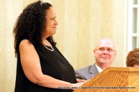 Alice Randall speaking while Christopher Burawa looks on