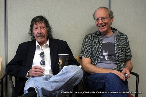 Michael White sitting next to author William Gay (left)