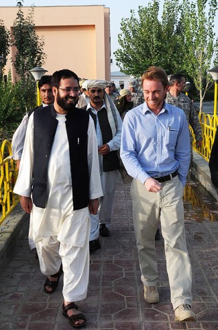 PAKTIKA PROVINCE, Afghanistan - Paktika Governor Moheebullah Samim (left) and Justin Kolbeck, Deptartment of State representative for the Paktika Provincial Reconstruction Team, share a laugh as they walk to the PRT-sponsored iftar dinner August 15th. (Photo by U.S. Air Force Master Sgt. Demetrius Lester, Paktika Provincial Reconstruction Team Public Affairs)