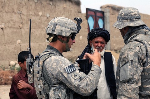 U.S. Army Staff Sgt. Jonathan Boos, discusses a possible well site with the Malik or village elder, of the village of Qaleh-Ye Mirza Jalal. The Soldiers conducted two key leader engagements and a presence patrol in the villages of Bajawri and Qaleh-Ye Mirza Jalal August 16th. During the engagements, U.S. Army 1st Lt. William Spears, a platoon leader from Chicago, and Boos, led discussions with the villages’ Maliks. (Photo by U.S. Army Pfc. Roy Mercon, Task Force Wolverine Public Affairs, 86th Infantry Brigade Combat Team [Mountain])