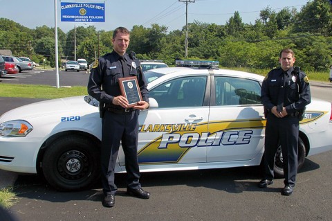 Left – Officer Sohn holding his Leadership Award Plaque, Right – Officer Leo Kryszewski