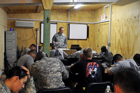 U.S. Army 1st Sgt. Ronald Wright of Granville, OH, Company A, 412th Civil Affairs Battalion, Task Force Bastogne, teaches a class on criminal justice at Forward Operating Base Fenty here August 10th. Even while deployed, Soldiers can continue to pursue their education. (Photo by U.S. Army Spc. Richard Daniels Jr., Task Force Bastogne Public Affairs)