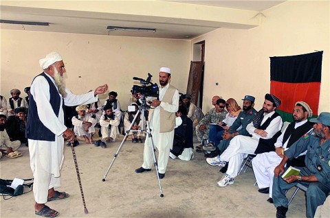 A local village elder (left) addresses the governor of Khowst Province, with his concerns and the needs of his village during a recent peace shura at Musa Kheyl Combat Outpost here Aug. 15th. Nearly 50 local tribal leaders and elders attended the historical meeting.  (Photo by U.S. Army Sgt. Brent C. Powell, 3rd Brigade, 101st Airborne Division)