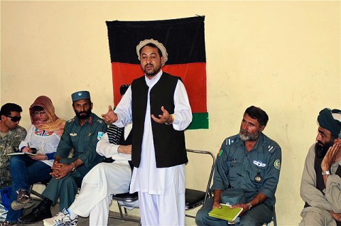 Mujahed, an elected provincial councilmember from Khwost Province addresses nearly 50 local tribal elders and leaders during a peace shura at Combat Outpost Musa Kheyl Aug. 15th. The historic meeting was the first time members of the new Government of the Islamic Republic of Afghanistan have been to the area. (Photo by U.S. Army Sgt. Brent C. Powell, 3rd Brigade, 101st Airborne Division)