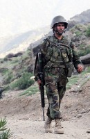 An Afghan National Army Soldier takes part in a joint patrol with International Security Assistance Forces to the village of Kuz Kormal. (Photo by U.S. Army Staff Sgt. Gary A. Witte, 300th Mobile Public Affairs Detachment)