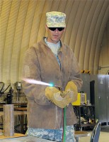 U.S. Army Chief Warrant Officer-2 Byrin D. Wheatley, an allied trades technician in the welding and machine shop of Company B, 626th Brigade Support Battalion, 3rd Brigade, 101st Airborne Division, recently orchestrated an extremely challenging vehicle recovery in Gardez saving the Army thousands of dollars.  (Photo by U.S. Army Sgt. Brent C. Powell, 3rd Brigade, 101st Airborne Division)