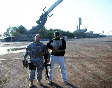 U.S. Army Staff Sgt. Gabriel Villalobos, stands with his Iraqi translator during his deployment to Iraq in 2006. Villalobos is a U.S. citizen who grew up in a Mexican border town. He joined the U.S. Army to give back to the country that has given him so much. (Photo courtesy of U.S. Army)