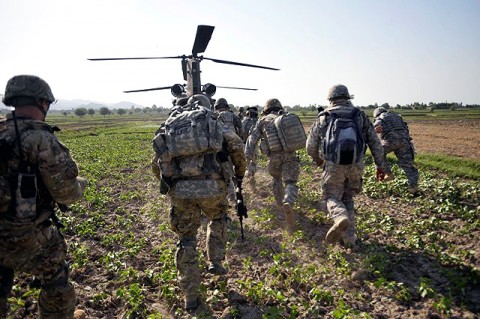 U.S. Army Soldiers with the Focused Tactical Force, 3rd Brigade Combat Team, 101st Airborne Division, run towards a CH-47 helicopter following an air-assault operation in Bak, Khost Province, Afghanistan July 7th.  (Photo by U.S. Army Pfc. Chris McKenna, 3rd Brigade Combat Team)